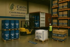 Cavin Resource warehouse with forklift loading 250L canola oil drums into a container, surrounded by stacked cartons and a 1000L flexitank pallet